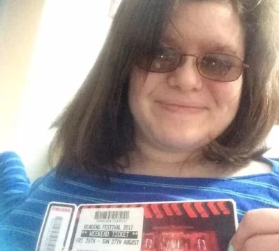 Emma holding Reading Festival ticket