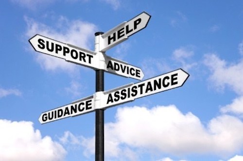 Street signs saying support advice guideance aand assistance