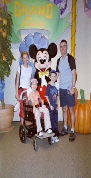 Emma & family photographed with Mickey Mouse at Disney World Florida – February 2004
