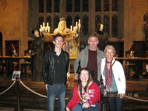 Emma and family in the great hall with Dumbledore
