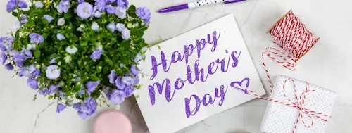 Boquette of flowers on left and purple text saying Happy Mother's Day on right