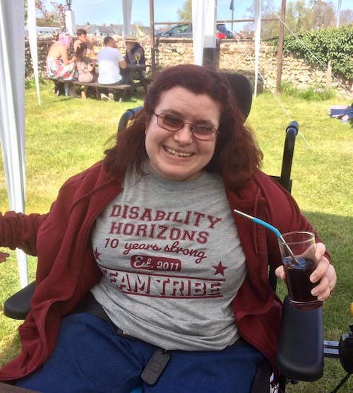 Emma-Purcell-wearing-her-Disability-Horizons-T-shirt-at-the-pub